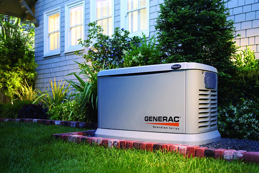 Standby generator installed beside a home