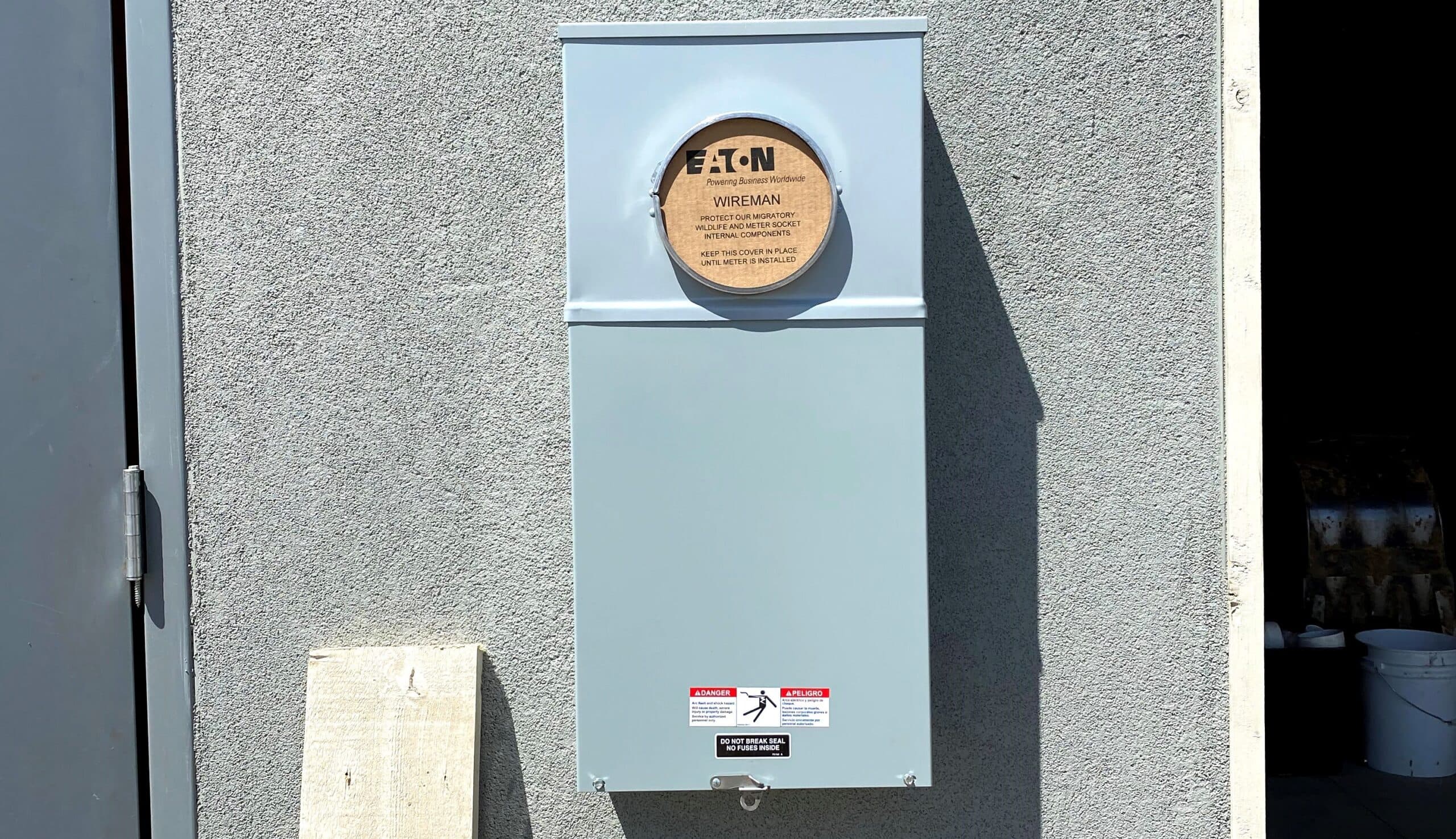 Exterior meter main panel installation