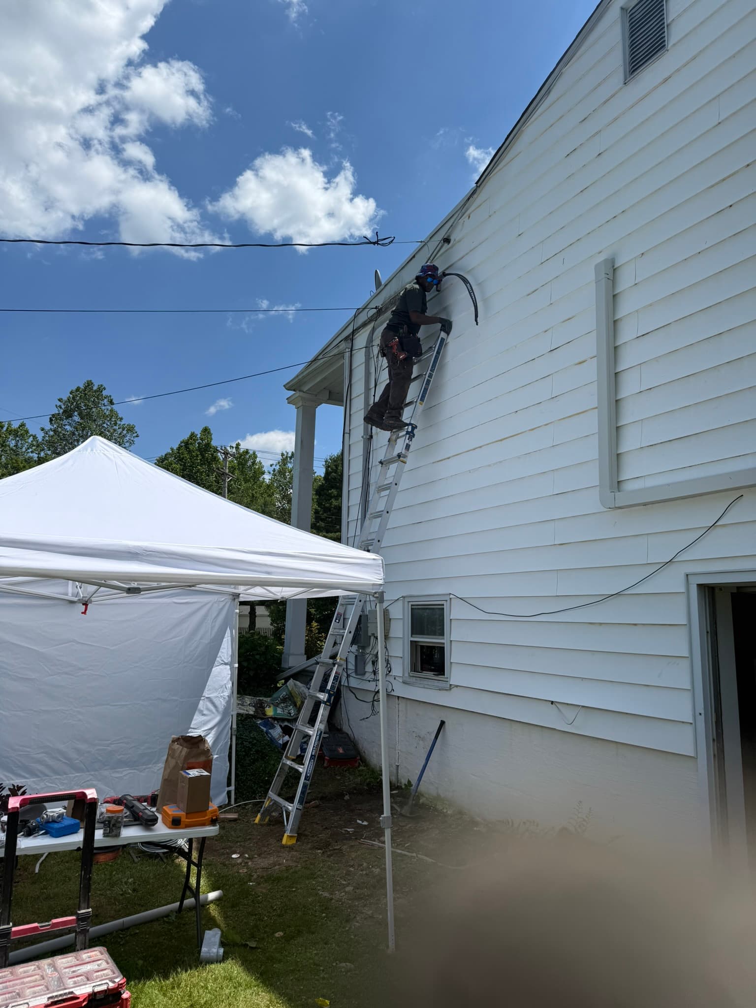 James finishing up our conduit and wire run, getting ready for the utility connection.