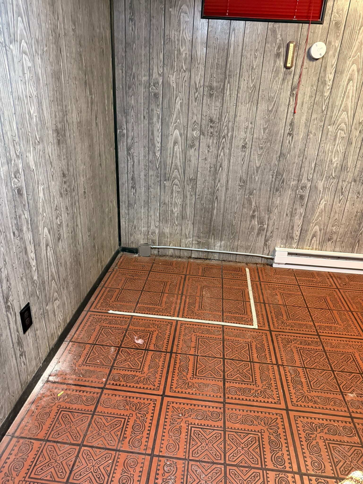 We moved the baseboard heater over a few feet to make room for the new Sauna. We also installed the new dedicated outlet on the left.