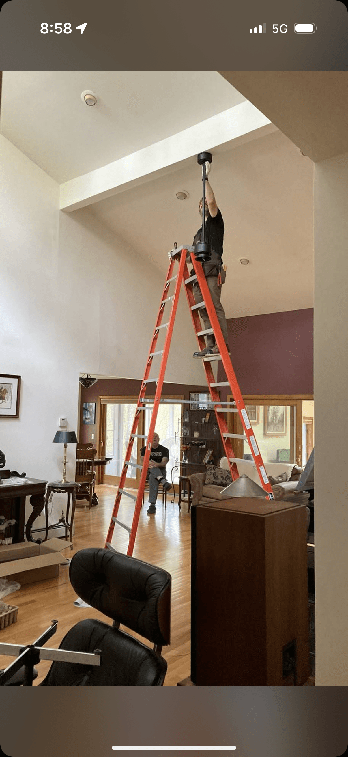Hangin' out with the homeowner, getting the job done.
