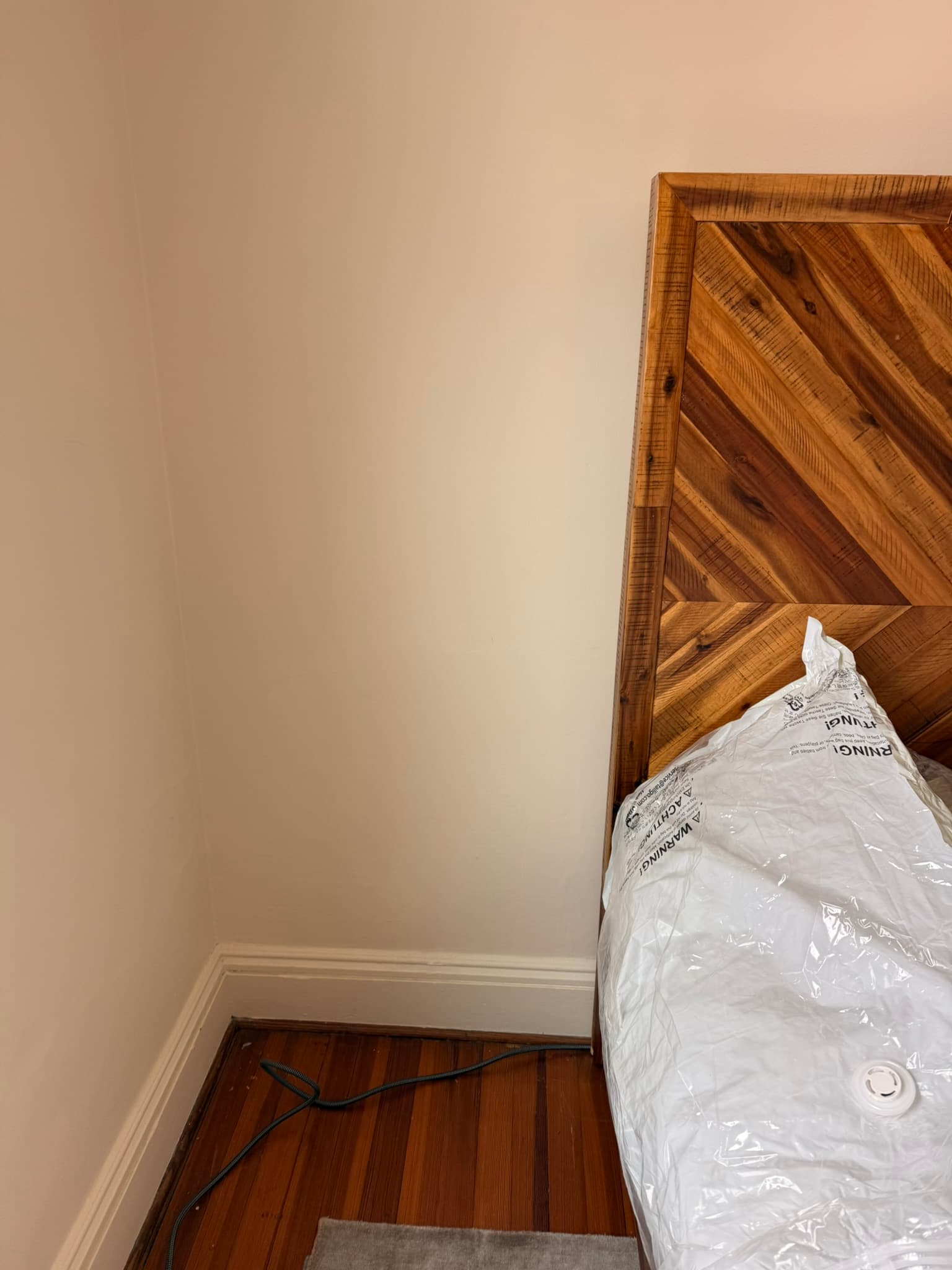There were no outlets in the master bedroom on either side of the bed. The customers had to run extension cords throughout the room. They now have one outlet on each side of the bed.
